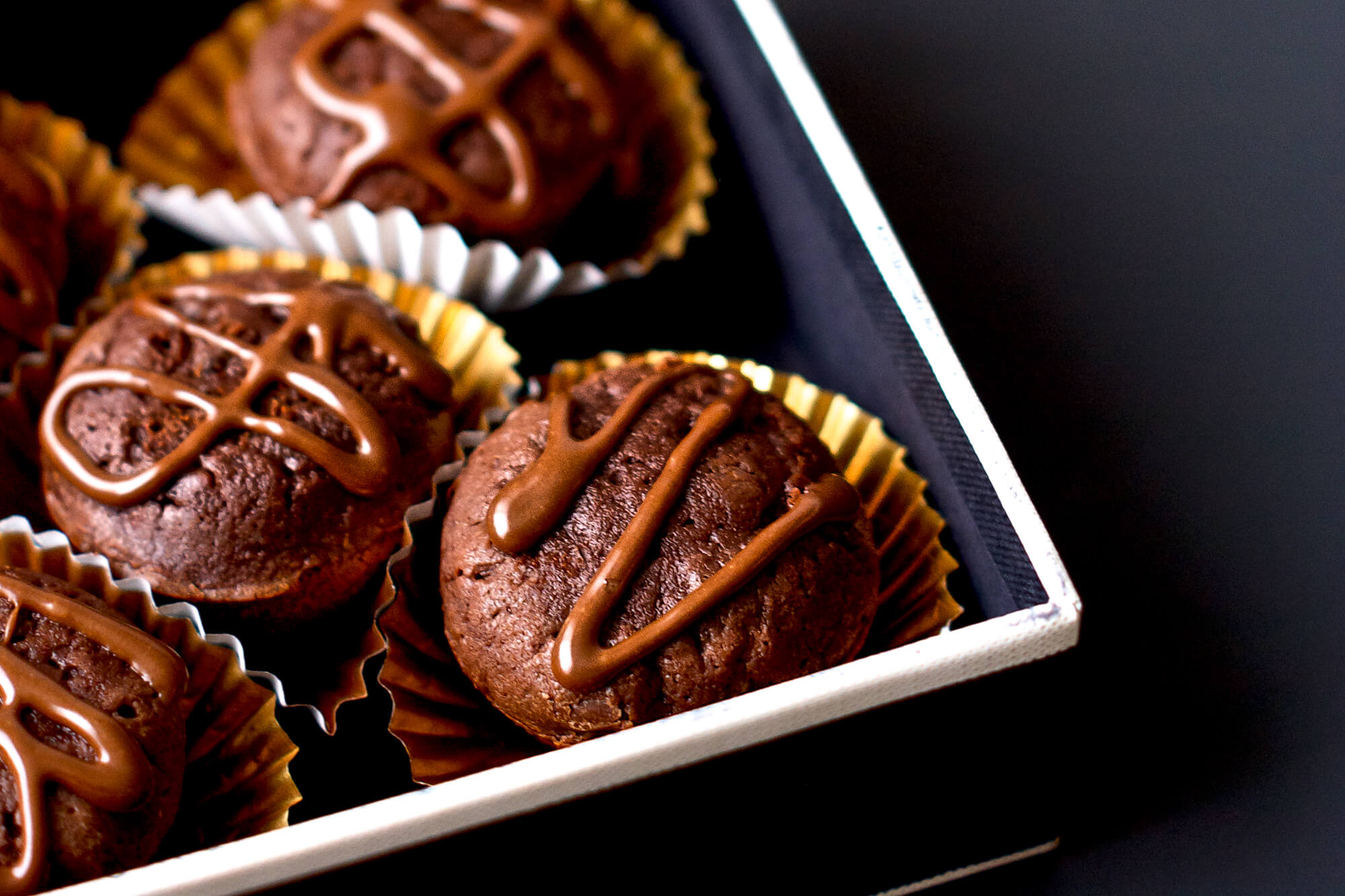 Perfectly portioned brownie bites. Rich and indulgent all by themselves. You can dress them up for a special occasion with a bit if chocolate glaze.