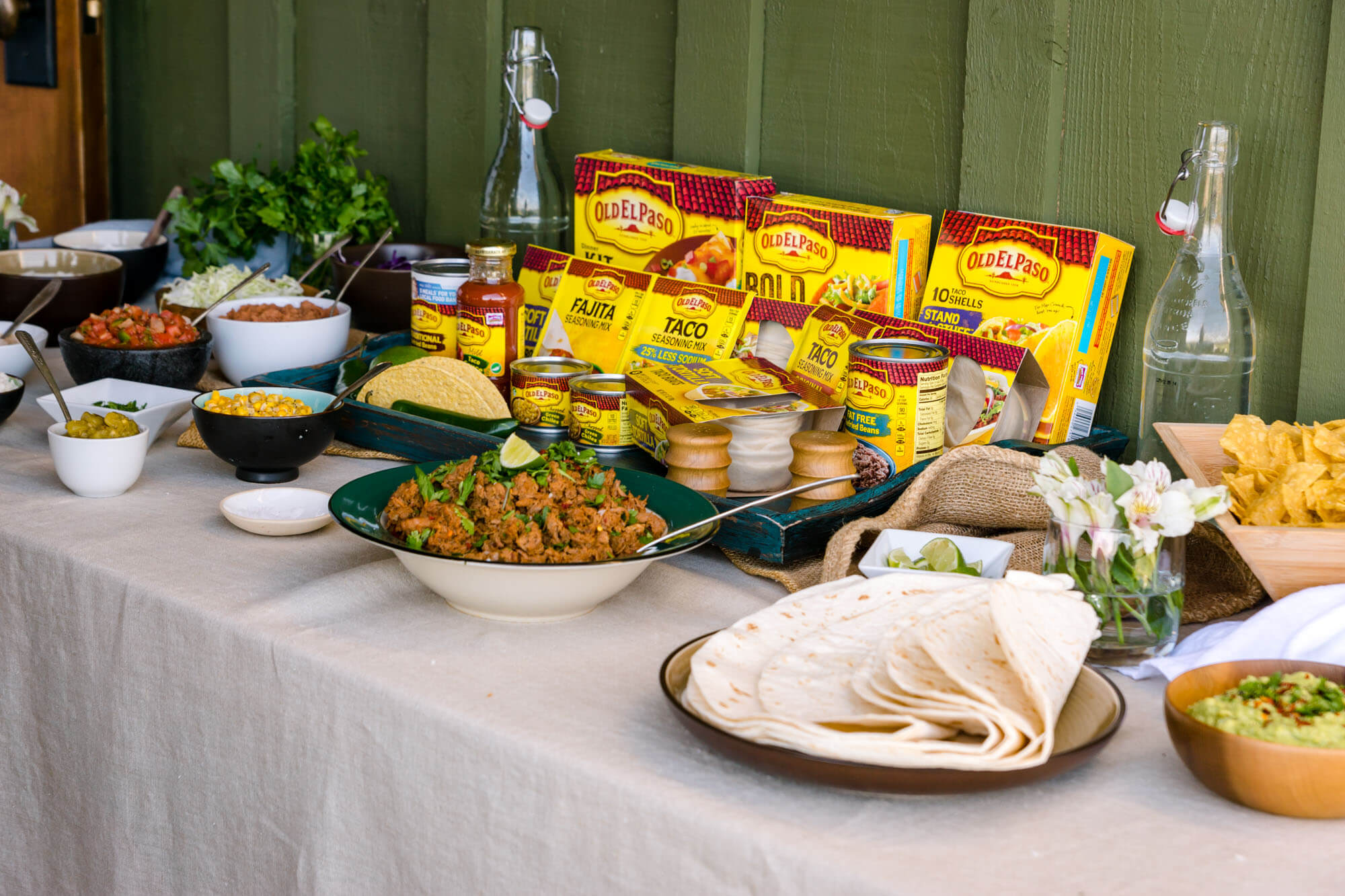 A healthy taco bar is an easy recipe for a weekend party. Use fresh ingredients & simple touches to turn a rustic taco bar into an elegant lunch buffet.