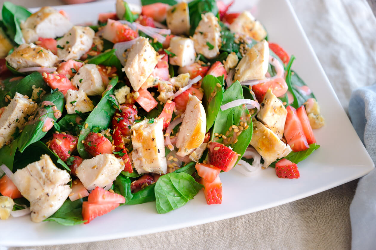 Celebrate the desire to eat light in spring and summer with this gorgeous spinach salad with grilled chicken and strawberries.