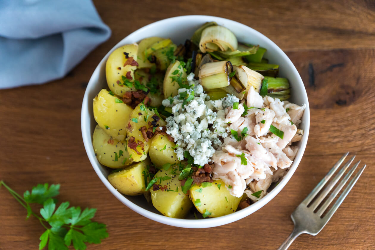 Potato lovers rejoice! Quick chicken bacon potato bowl with buttery leeks is healthy comfort food you can make in minutes.